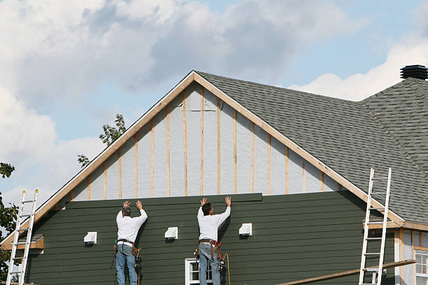 Professional Vinyl Siding technician working in New Philadelphia, OH